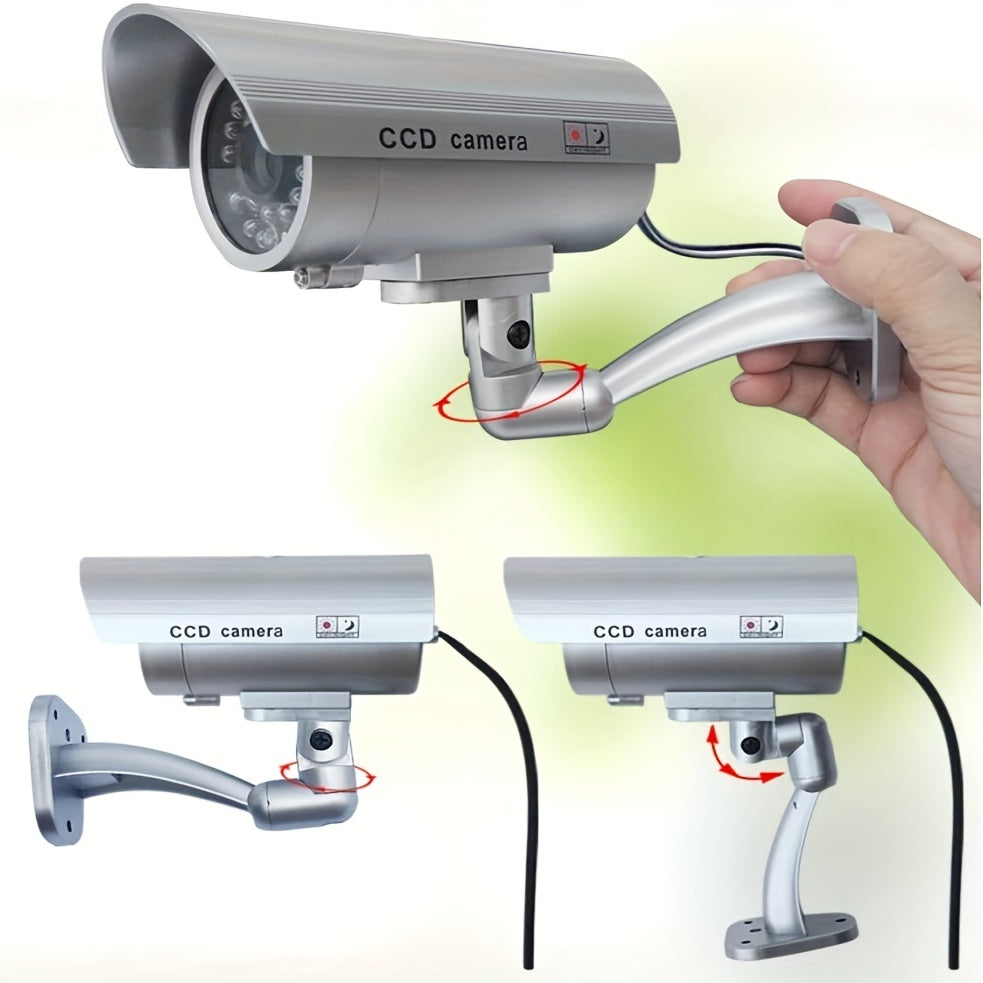 Caméra de surveillance factice – Système de vidéosurveillance simulée, lumières LED réalistes, support réglable et autocollants d'avertissement, caméra leurre de sécurité pour intérieur et extérieur – Lot de 2 ou 4