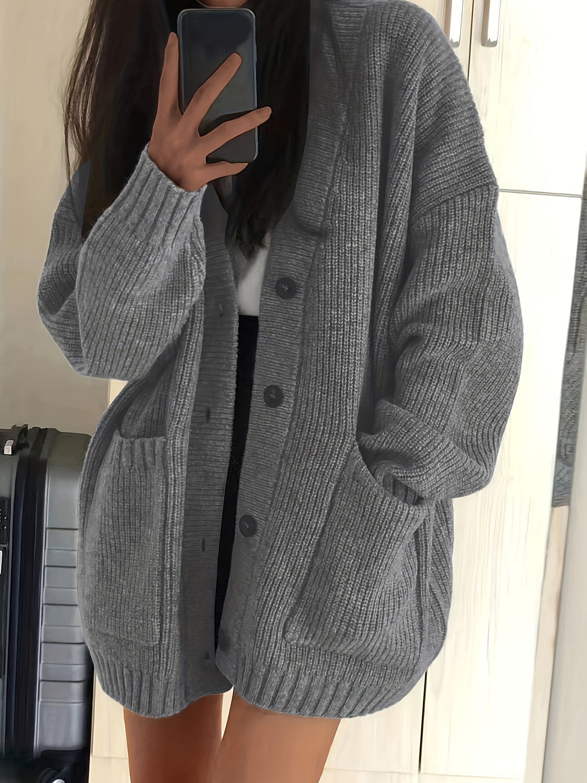 Gilet cardigan oversize en maille côtelée à col en V et boutons pour femme, idéal pour l'automne et l'hiver, confortable et décontracté.