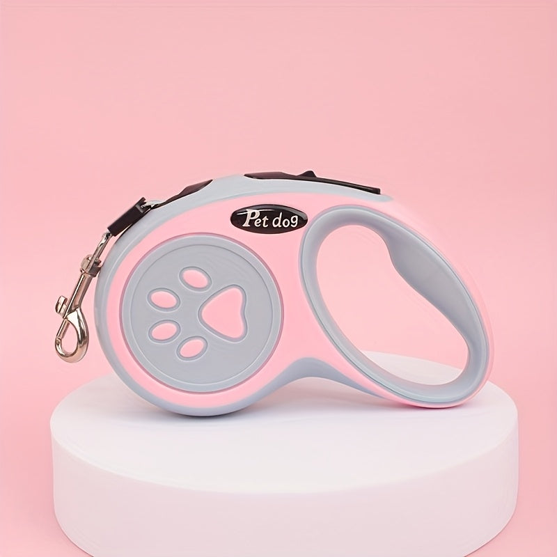 Laisse rétractable pour chien motif empreinte de patte - 4 options de couleur, laisse extensible de 3 m ou 5 m pour petits chiens, laisse ergonomique à commande à un bouton pour la promenade et l'extérieur (Noir/Rose/Bleu/Vert)
