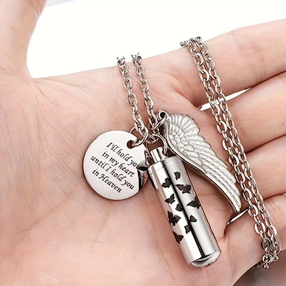 Collier urne cylindrique pour cendres - Pendentif commémoratif en acier inoxydable avec papillon et aile d'ange, bijou de crémation pour perte d'animal de compagnie ou d'être cher, pour femmes et hommes (argenté)