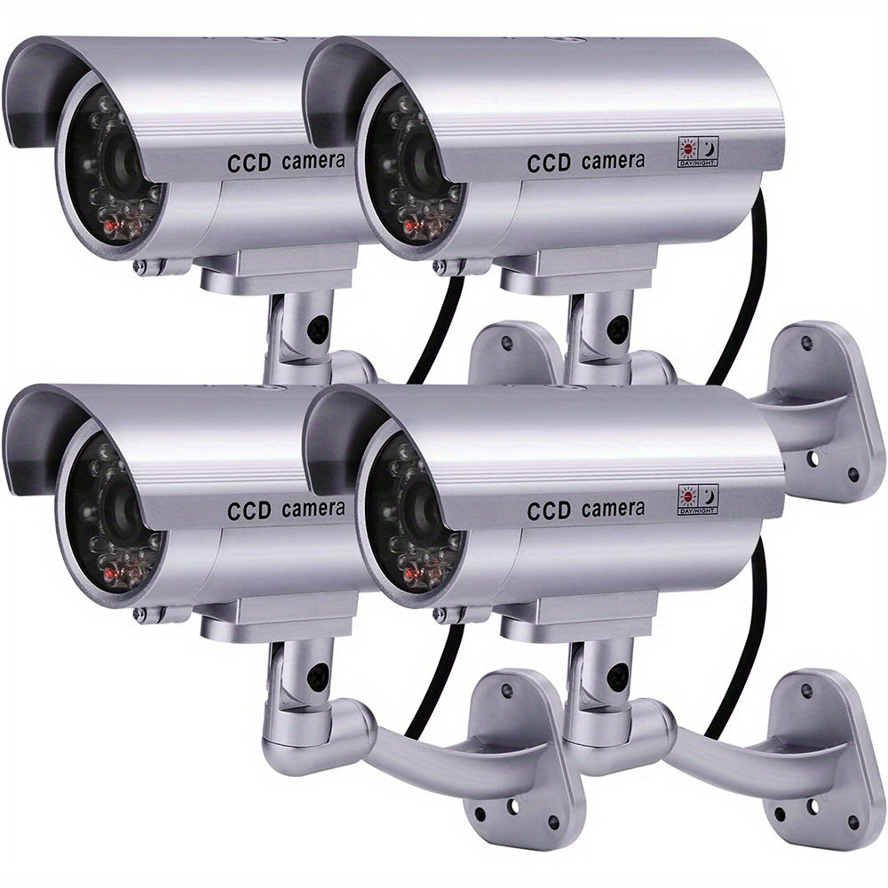 Caméra de surveillance factice – Système de vidéosurveillance simulée, lumières LED réalistes, support réglable et autocollants d'avertissement, caméra leurre de sécurité pour intérieur et extérieur – Lot de 2 ou 4