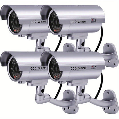 Caméra de surveillance factice – Système de vidéosurveillance simulée, lumières LED réalistes, support réglable et autocollants d'avertissement, caméra leurre de sécurité pour intérieur et extérieur – Lot de 2 ou 4