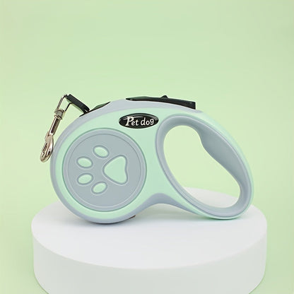 Laisse rétractable pour chien motif empreinte de patte - 4 options de couleur, laisse extensible de 3 m ou 5 m pour petits chiens, laisse ergonomique à commande à un bouton pour la promenade et l'extérieur (Noir/Rose/Bleu/Vert)