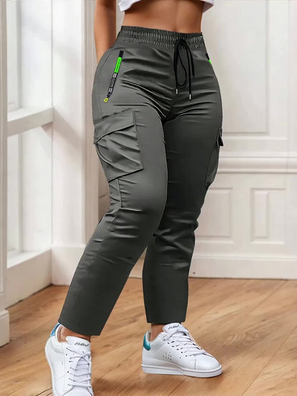 Pantalon cargo multipoches pour femme – Détails zippés vert néon, taille à cordon de serrage, pantalon outdoor pleine longueur pour le voyage, 4 coloris, tailles XS à XXL, streetwear décontracté printemps-automne