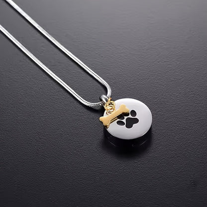 Collier urne avec empreinte de patte pour cendres d'animaux - Pendentif médaillon souvenir rond en acier inoxydable pour le mémorial de chien et chat, bijoux de crémation porte-cendres pour le deuil d'un animal (argenté)