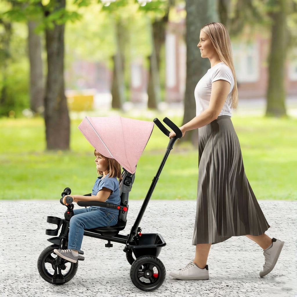 Tricycle 4-en-1 pour tout-petits avec poignée de poussée réglable et siège convertible, auvent amovible, harnais de sécurité et panier de rangement - Tricycle à pousser pour enfants de 18 à 60 mois, vélo rose à chevaucher pour filles