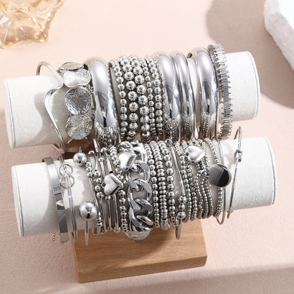 Ensemble de bracelets à breloques vintage avec nœud et imprimé léopard pour femme – Bracelets bohèmes en cordon irrégulier, styles et couleurs aléatoires, argent et or, lot de 7 ou 16 pièces pour les vacances et le quotidien