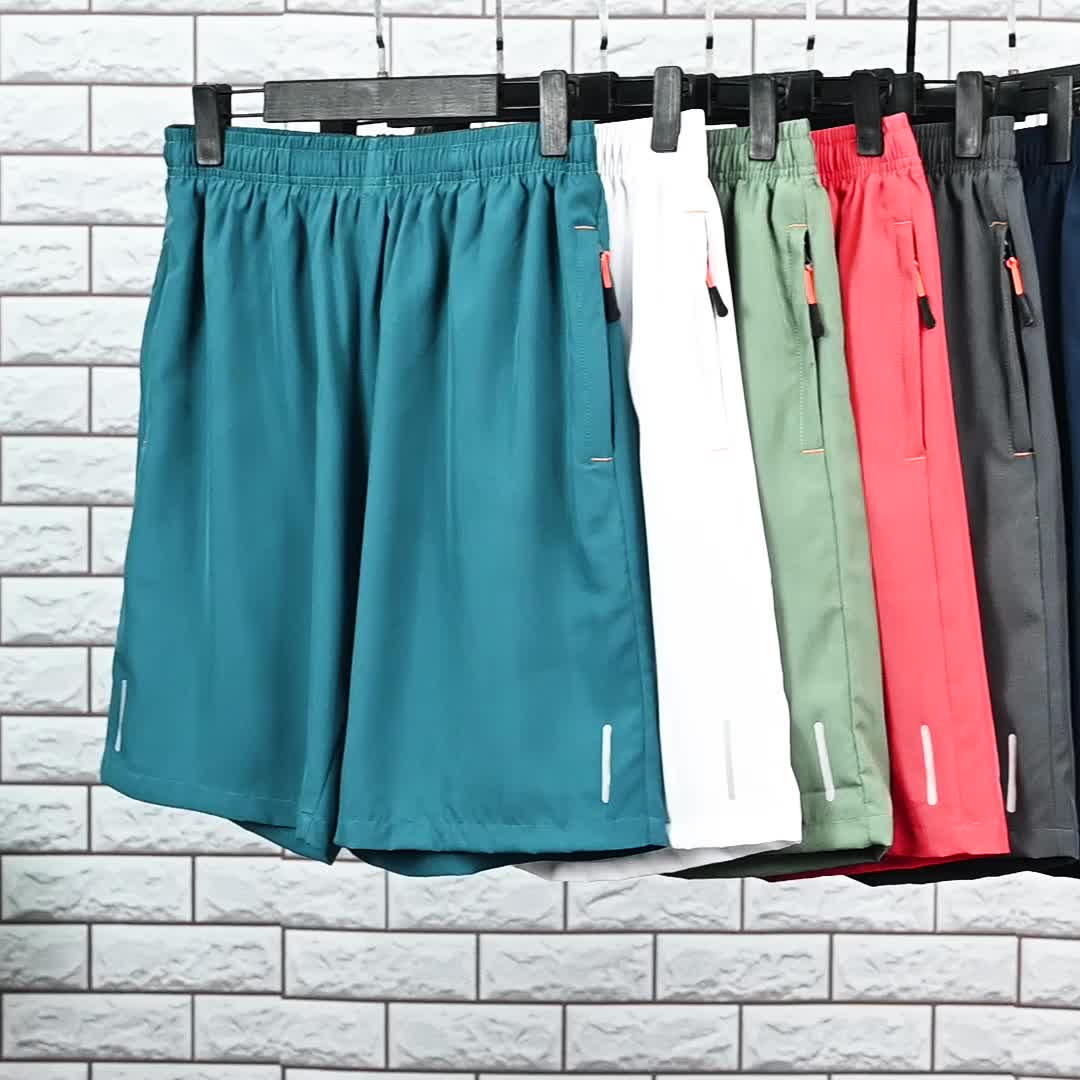 Shorts de sport à séchage rapide pour homme avec poches – Short de gym léger à cordon de serrage pour la course, l'entraînement et le quotidien, 7 couleurs, tailles S-XXL, coupe confort gaufrée