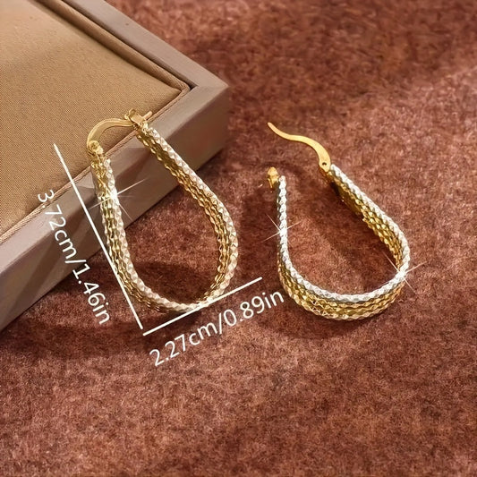 Boucles d'oreilles créoles dorées pour femmes, design goutte d'eau ovale effet ondulation, boucles d'oreilles pendantes en cuivre doré légères, bijoux chics et élégants, cadeau pour elle