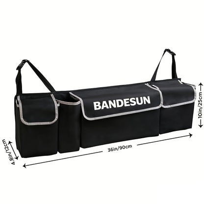 Organisateur de coffre de voiture à suspendre au siège arrière avec 4 poches, sac de rangement pliable pour SUV, camion, monospace et fourgon – Organisateur de rangement intérieur noir à poches multiples pour les voyages et l'usage quotidien