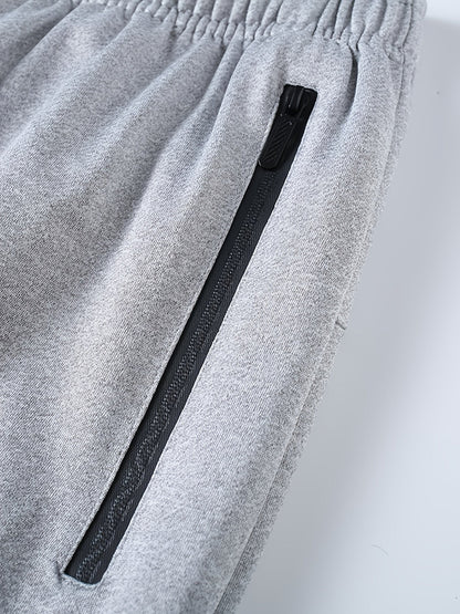 Pantalon de jogging pour homme avec cordon de serrage et poches, coupe classique resserré aux chevilles, en 95 % polyester pour le running, l'entraînement, le quotidien, le printemps et l'automne – Pantalon de sport confortable pour homme
