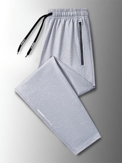 Pantalon de jogging pour homme avec cordon de serrage et poches, coupe classique resserré aux chevilles, en 95 % polyester pour le running, l'entraînement, le quotidien, le printemps et l'automne – Pantalon de sport confortable pour homme