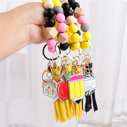 Ensemble cadeau de 4 porte-clés à perles pour enseignant – Porte-clés artisanaux avec breloques crayon, pomme, carnet et mot « TEACH », fermoir mousqueton, cadeau pour la fête des enseignants, remise de diplôme ou rentrée scolaire, pendentif pour sac