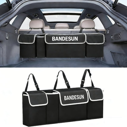 Organisateur de coffre de voiture à suspendre au siège arrière avec 4 poches, sac de rangement pliable pour SUV, camion, monospace et fourgon – Organisateur de rangement intérieur noir à poches multiples pour les voyages et l'usage quotidien