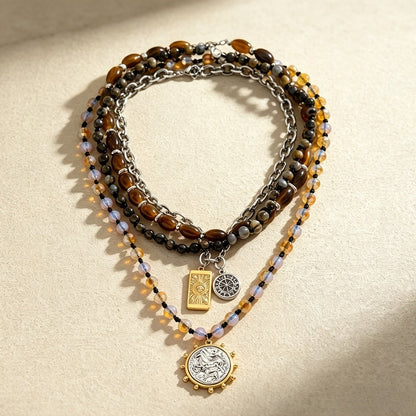 Collier bohème multi-rangs en perles d’œil-de-tigre pour femme – Pendentif boussole vintage, chaîne claviculaire superposable, bijou bohème tendance pour le quotidien, les fêtes et les cadeaux de vacances